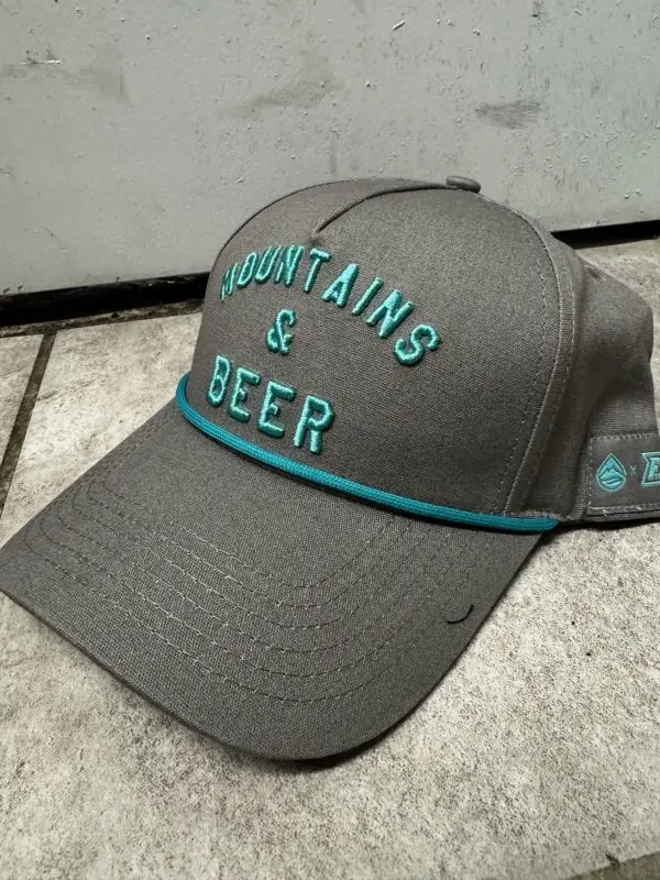 distant brewing mountains and beer hat gray and teal side