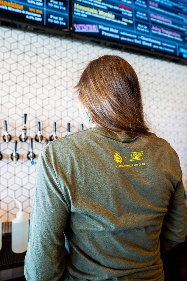 mountains and beer long sleeve green shirt back