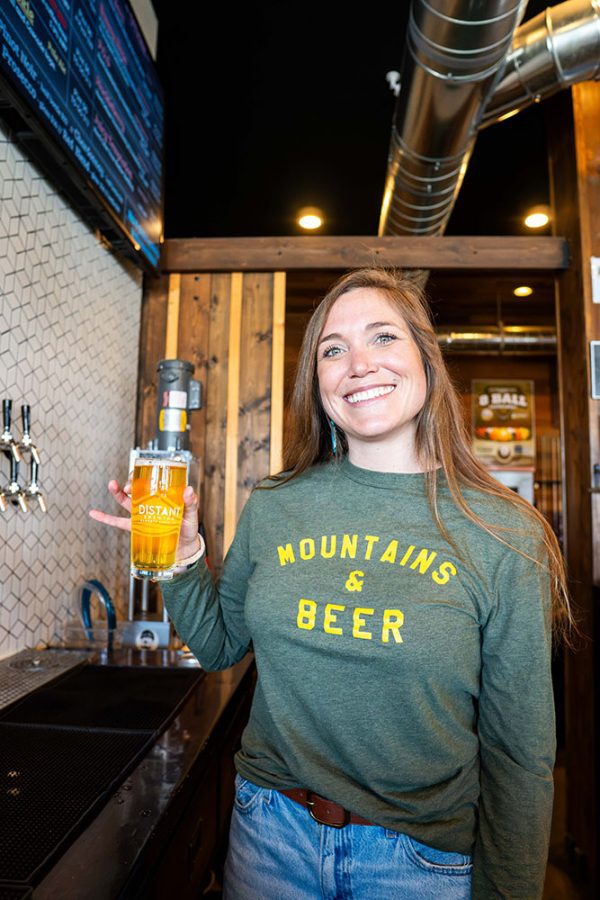mountains and beer long sleeve green shirt front